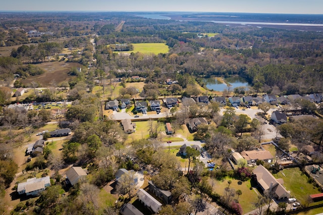 bird's eye view with a residential view, a forest view, and a water view