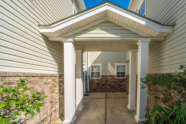 exterior space featuring brick siding