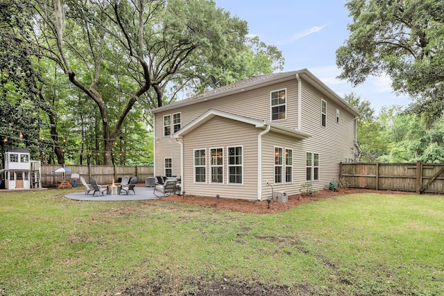 3873 Hanoverian Dr, Mount Pleasant, SC 29429 - rear view of house with a patio and an outdoor fire pit
