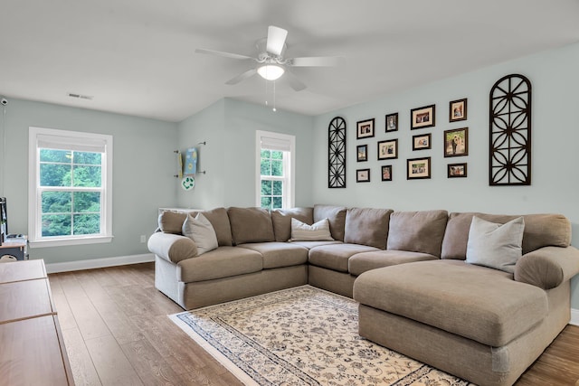 3873 Hanoverian Dr, Mount Pleasant, SC 29429 - living area with wood finished floors, ceiling fan, and baseboards