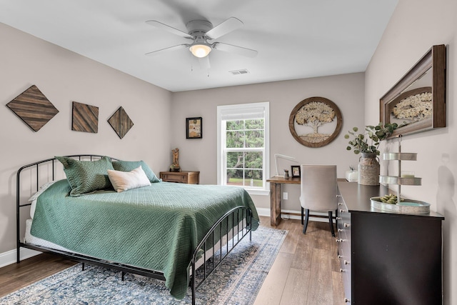 3873 Hanoverian Dr, Mount Pleasant, SC 29429 - bedroom with light wood finished floors, baseboards, and ceiling fan