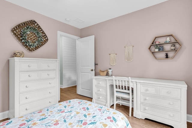 3873 Hanoverian Dr, Mount Pleasant, SC 29429 - bedroom with light wood-style flooring and baseboards