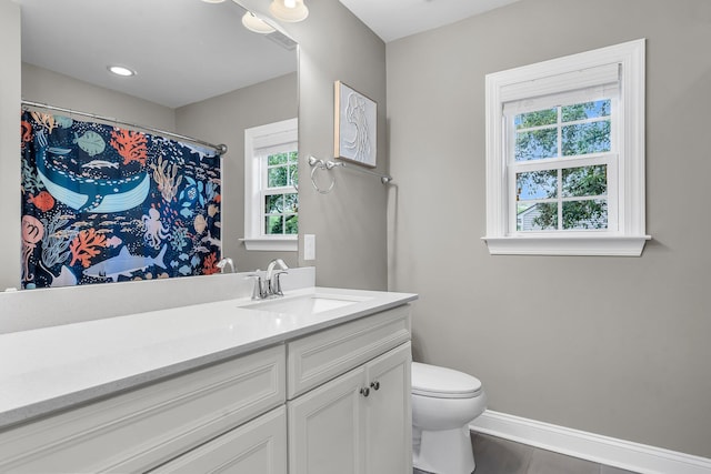 3873 Hanoverian Dr, Mount Pleasant, SC 29429 - bathroom featuring toilet, vanity, and baseboards