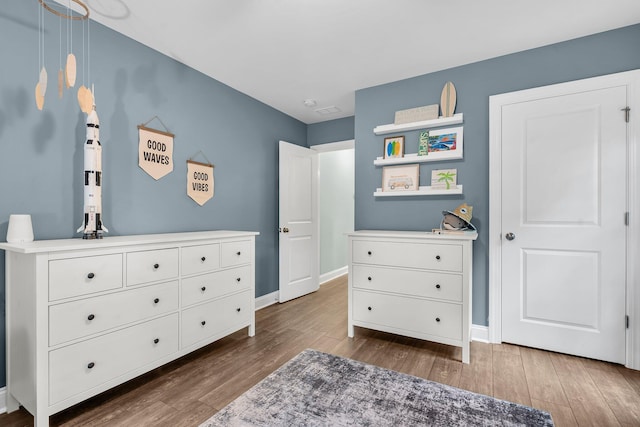 3873 Hanoverian Dr, Mount Pleasant, SC 29429 - bedroom featuring dark wood-style floors and baseboards
