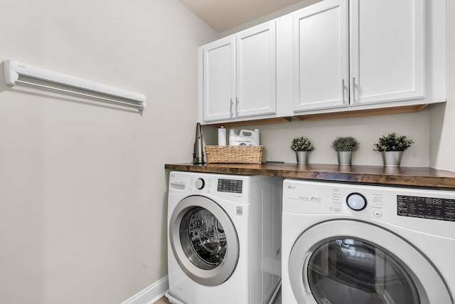3873 Hanoverian Dr, Mount Pleasant, SC 29429 - laundry room featuring washing machine and dryer, cabinet space, and baseboards