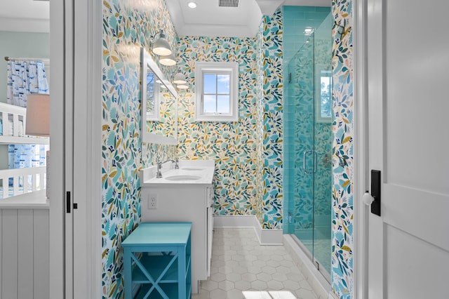 bathroom featuring vanity, visible vents, tile patterned floors, a stall shower, and wallpapered walls