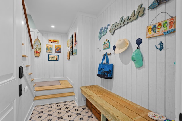 mudroom with recessed lighting, baseboards, and light floors