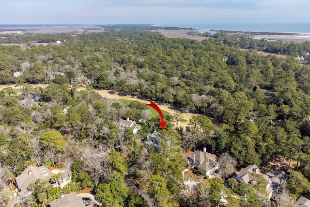 aerial view featuring a wooded view