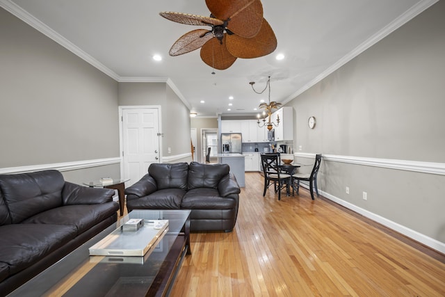 81 Sandbar Ln Unit 23, Folly Beach, SC 29439 - living room with recessed lighting, crown molding, ceiling fan, and light wood-style flooring