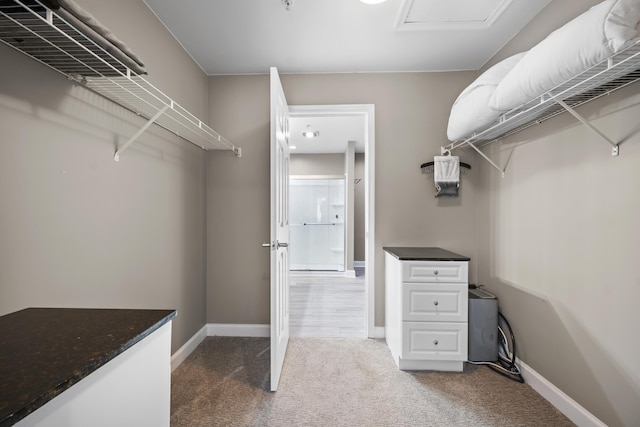 81 Sandbar Ln Unit 23, Folly Beach, SC 29439 - spacious closet featuring carpet and attic access