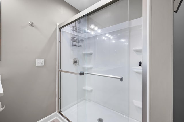 81 Sandbar Ln Unit 23, Folly Beach, SC 29439 - bathroom with a shower stall