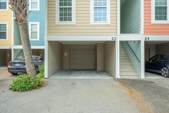 81 Sandbar Ln Unit 23, Folly Beach, SC 29439 - entrance to property with driveway and a carport