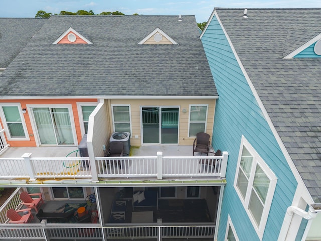 81 Sandbar Ln Unit 23, Folly Beach, SC 29439 - back of property featuring a balcony and roof with shingles