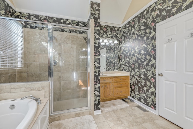 bathroom featuring lofted ceiling, tile patterned flooring, separate shower and tub, ornamental molding, and vanity