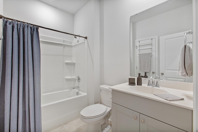full bath with toilet, shower / bath combo with shower curtain, vanity, and tile patterned floors
