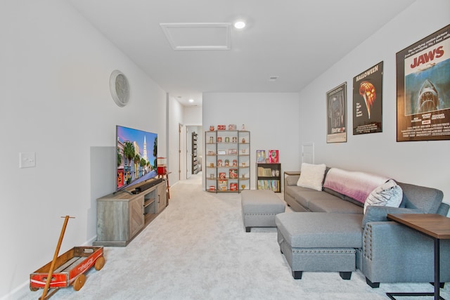 living room with attic access, carpet flooring, and recessed lighting
