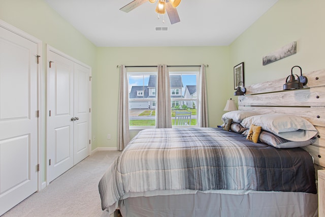 bedroom with carpet floors, a ceiling fan, and baseboards