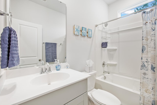 full bath with vanity, shower / bath combination with curtain, and toilet