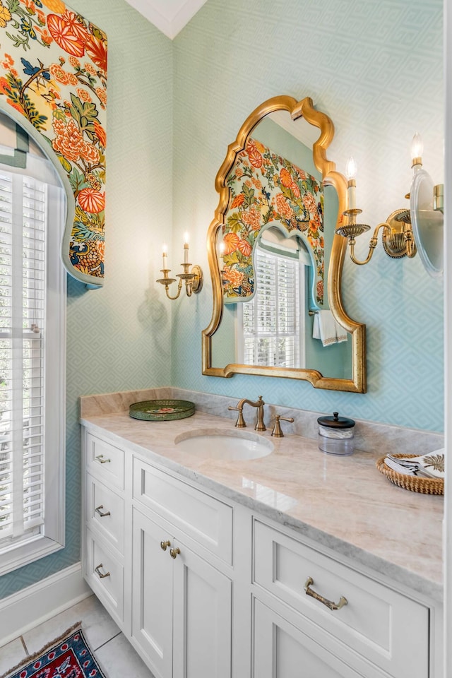 bathroom featuring tile patterned flooring and vanity