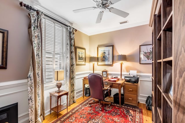 office with crown molding, ceiling fan, and light hardwood / wood-style floors