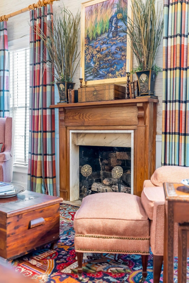 living area featuring a fireplace