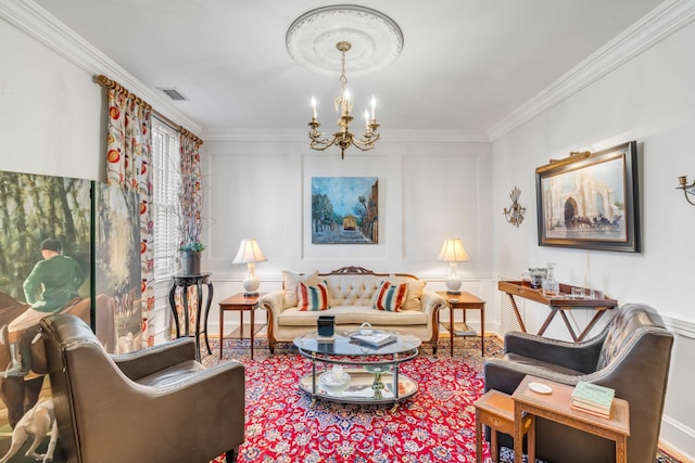 living room featuring a notable chandelier and crown molding