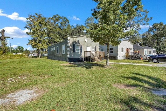 view of front of house featuring a front yard