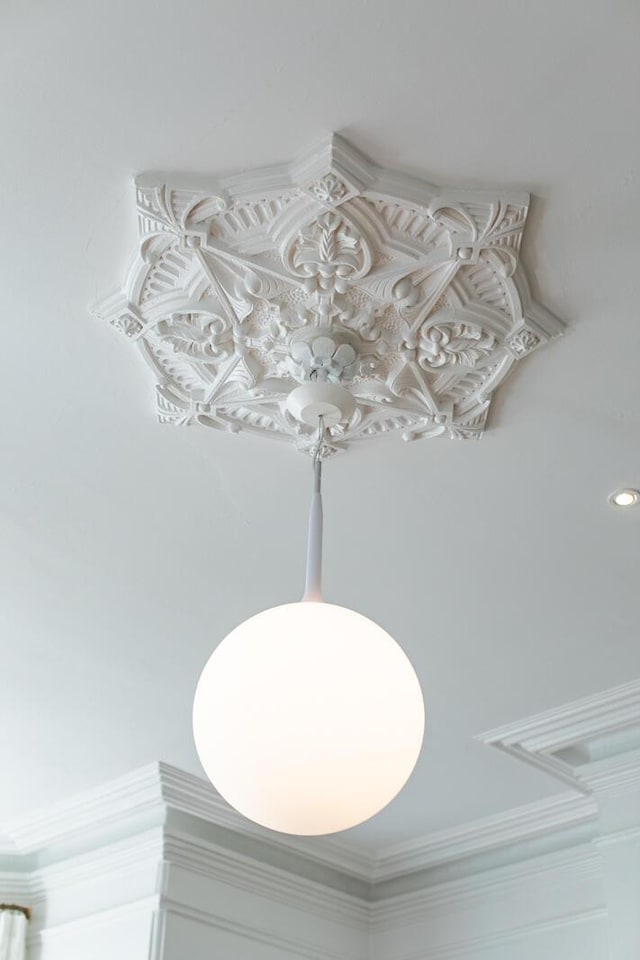 155 Wentworth St Unit A, Charleston, SC 29401 - interior details featuring crown molding