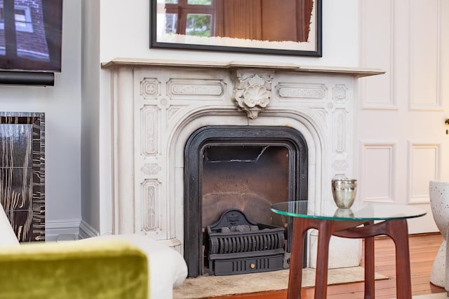 155 Wentworth St Unit A, Charleston, SC 29401 - details with a fireplace and wood finished floors