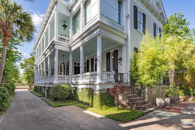 155 Wentworth St Unit A, Charleston, SC 29401 - view of side of home featuring covered porch and stairs