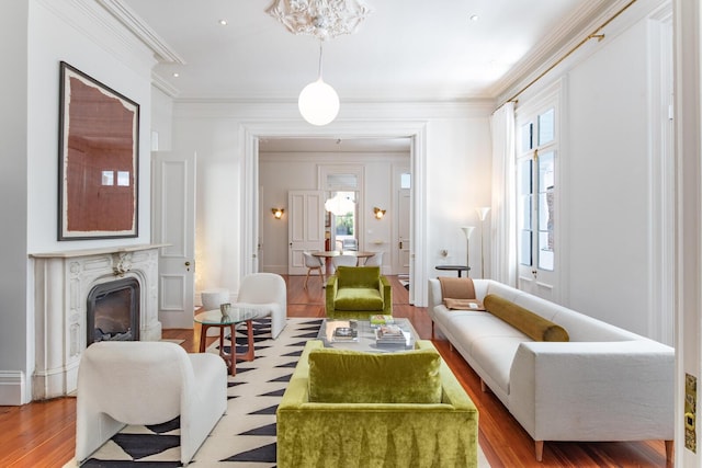 155 Wentworth St Unit A, Charleston, SC 29401 - living room featuring a high end fireplace, wood finished floors, and ornamental molding