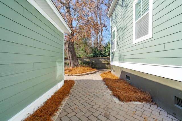 view of property exterior featuring a patio area