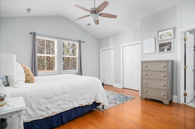 bedroom featuring lofted ceiling, ceiling fan, and hardwood / wood-style flooring