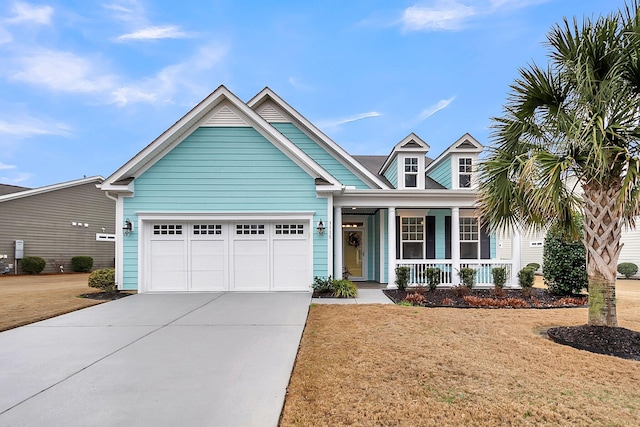 3115 Cross Vine Ln, Summerville, SC 29483 - view of front of home with concrete driveway, a garage, and covered porch