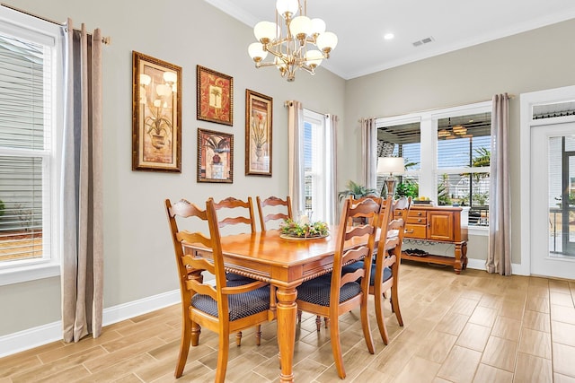 3115 Cross Vine Ln, Summerville, SC 29483 - dining room featuring visible vents, baseboards, wood tiled floor, ornamental molding, and an inviting chandelier