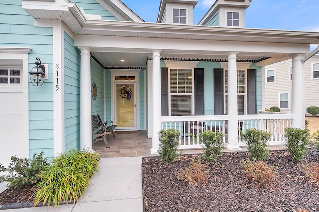 entrance to property with covered porch