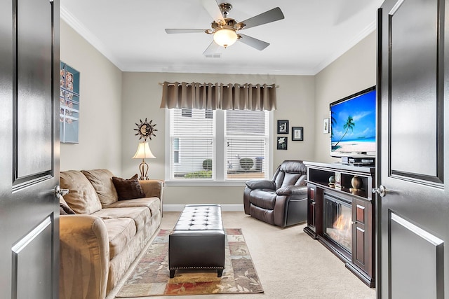 3115 Cross Vine Ln, Summerville, SC 29483 - living area featuring a ceiling fan, light colored carpet, baseboards, and ornamental molding