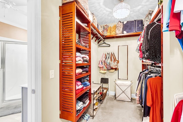3115 Cross Vine Ln, Summerville, SC 29483 - spacious closet featuring ceiling fan with notable chandelier and carpet