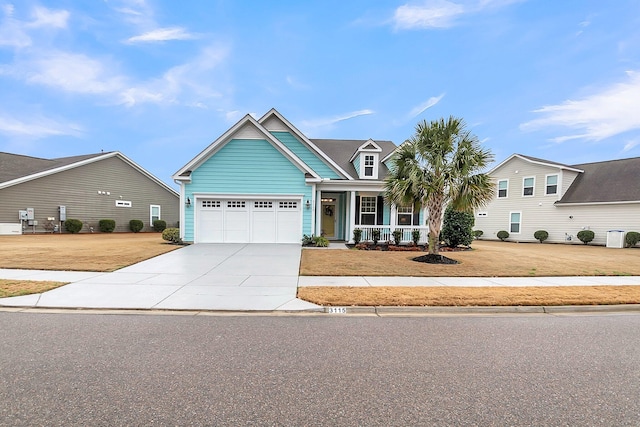 3115 Cross Vine Ln, Summerville, SC 29483 - view of front facade with a porch, driveway, and a garage