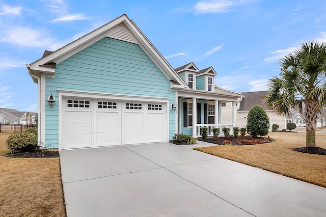 3115 Cross Vine Ln, Summerville, SC 29483 - view of front facade featuring a porch, a front lawn, driveway, and a garage