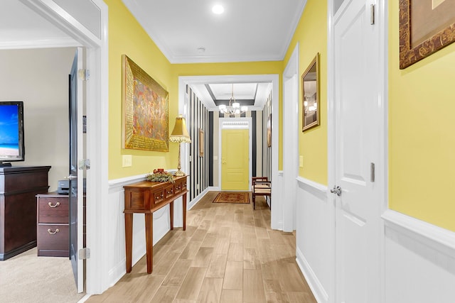 3115 Cross Vine Ln, Summerville, SC 29483 - hallway featuring light wood-type flooring, baseboards, a notable chandelier, and ornamental molding