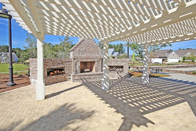 3115 Cross Vine Ln, Summerville, SC 29483 - view of patio / terrace featuring a pergola and an outdoor brick fireplace