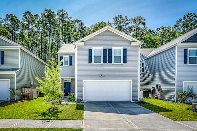 front of property with a garage, a front lawn, and central AC unit