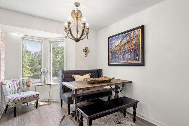 1647 Live Oak Park, Seabrook Island, SC 29455 - dining area with wood finished floors, a chandelier, and baseboards
