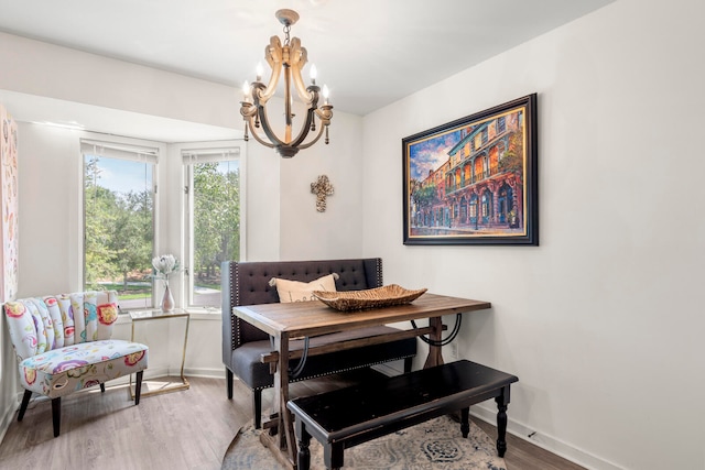 interior space featuring hardwood / wood-style flooring and a notable chandelier