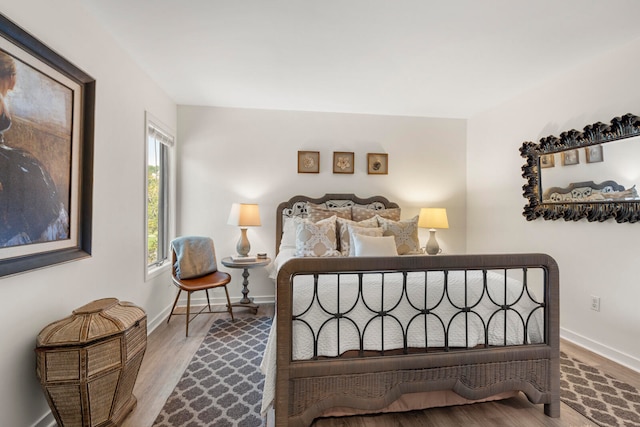 bedroom featuring hardwood / wood-style flooring