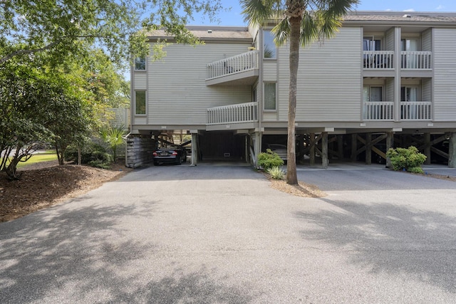 1647 Live Oak Park, Seabrook Island, SC 29455 - view of property featuring a carport and driveway