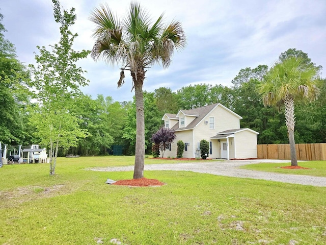 9489 Sidneys Rd, Round O, SC 29474 - view of front of home featuring gravel driveway and view of wooded area