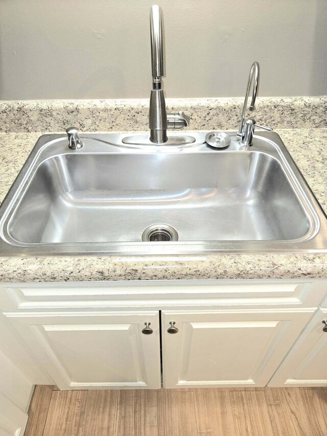9489 Sidneys Rd, Round O, SC 29474 - kitchen view of a sink and white cabinetry