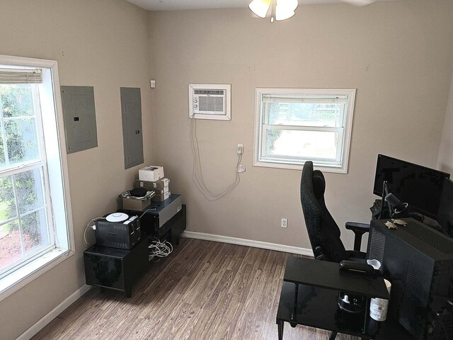 9489 Sidneys Rd, Round O, SC 29474 - office featuring electric panel, a wall mounted air conditioner, and plenty of natural light